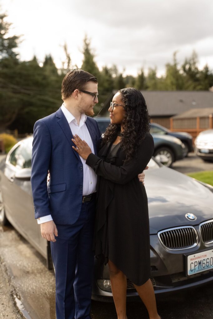 Mak parshall with maleah parshall infront of bmw 335xi. Leadmancer ai lead genreration founder image
